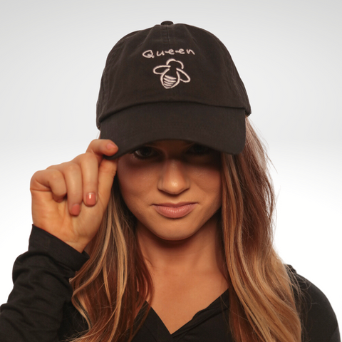 Queen Bee Baseball Cap - Black - BeeAttitudes Real queens fix each other's crowns.  We found your new go-to hat! Our embroidered ball caps make the perfect gift for someone who’s gone out of their way to show you kindness, or a little inspirational reminder to yourself. Either way, it will be sure to make someone smile!  Made with 100% cotton, the unstructured style gives a nice comfortable fit. Structure: Unstructured Fabric: 100% cotton twill Profile: Low Closure: Velcro Graphic Tee