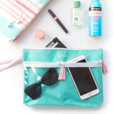 Wristlet Pouch - Teal - BeeAttitudes Sometimes what you are most afraid of doing is the very thing that will set you free.  Calling all you beach babes! Our turquoise + blush Beach Pouch is the perfect summer accessory. Fully Waterproof, Bee Free of worry this summer with our plastic pocket design so you can toss that ziplock bag and keep your phone dry in style!
