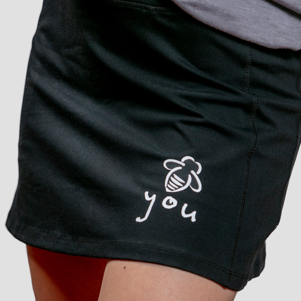 Bee You Running Skort (with Pocket) - Black - BeeAttitudes - Fitness - Yoga - Hiking Just Be You!  The skort that takes you from the gym to the trails to the streets.  Made from the perfect blend of nylon and spandex so it holds you in but has the just the right amount of stretch to bend with you in comfort.  Light mesh shorts lining underneath with pocket to carry your phone, keys or whatever else to keep your hands free. Graphic Tee
