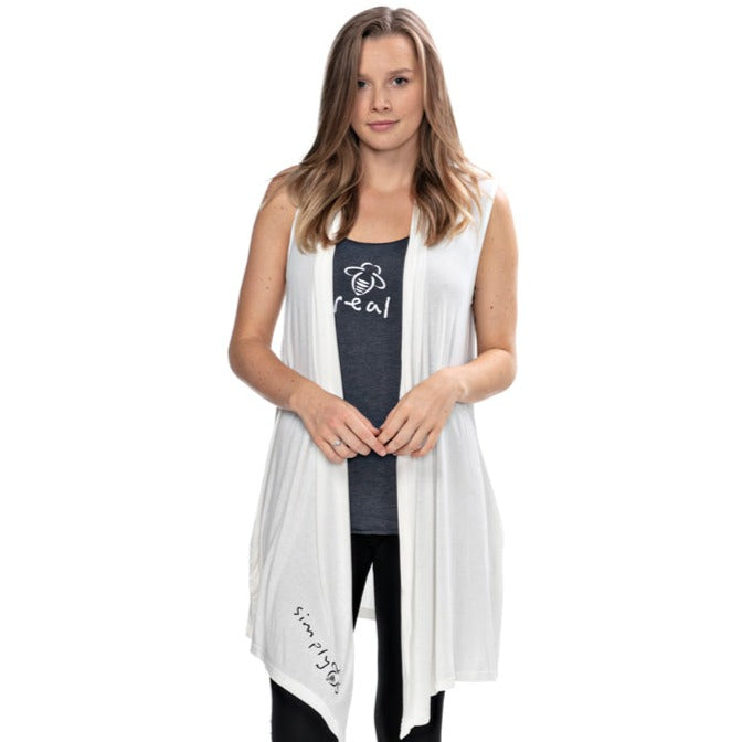 Simply Bee White Vest - BeeAttitudes Empty your mind, stop thinking about anything. Simply be.  An open shawl with pockets - throw it on over your work-out outfit on your way out of the gym or throw over a cute tank with jeans - so versatile - and it has pockets!  95% Rayon + 5% Spandex  One Size Fits Most